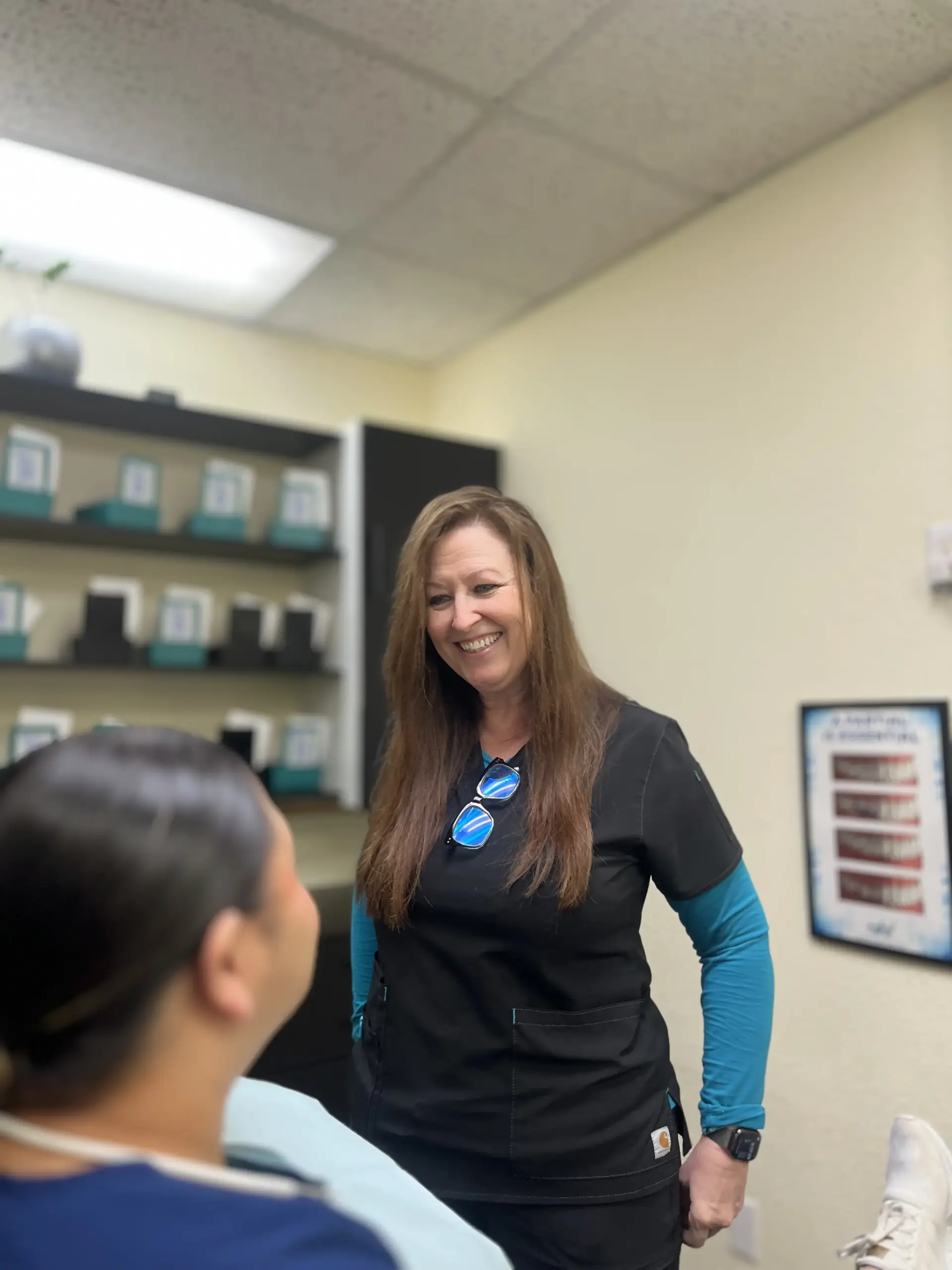 Denturist Lisa Lanham with patient